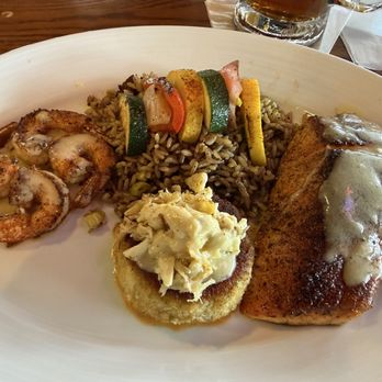 Fish Tales - Broiled Trio w/ Blackened Salmon, Shrimp, and Crab Cake - Seafood Near Me - Galveston, Texas Fish Tales - Broiled Trio w/ Blackened Salmon, Shrimp, and Crab Cake - Seafood Near Me - Galveston, Texas