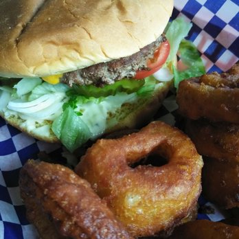 Jim Bob's Chuck Wagon - 1/2 lb Angus Burger with onion rings - Barbeque Near Me - Mckenna, Washington Jim Bob's Chuck Wagon - 1/2 lb Angus Burger with onion rings - Barbeque Near Me - Mckenna, Washington