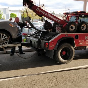 Airport Towing - Jim unloading the car in the dealership - Towing Near Me - Burien, Washington