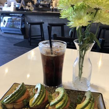 Cafe Amico - Avocado toast with iced americano - Coffee & Tea Near Me - Suwanee, Georgia