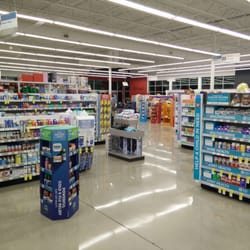 A diagonal aisle from the entrance to the pharmacy.