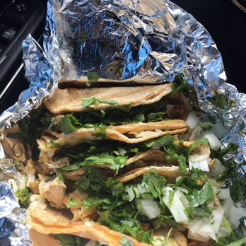 Tortas Ahogadas - 2 steak & 2 chicken Mexican style tacos. Yes I'm in the car...I couldn't wait to eat them. - Mexican Near Me - Forest Park, Georgia