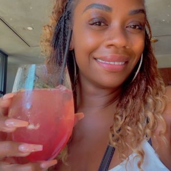 Echo & Rig - I forgot the name of this drink, but it does have hibiscus flavored tequila. It's has a cute garnish and it topped with champagne. - Steakhouses Near Me - Sacramento, California