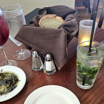 Salt Rock Grill - Sangria, Mojito, Bread and fresh herb and olive oil drippings - New American Near Me - Indian Shores, Florida Salt Rock Grill - Sangria, Mojito, Bread and fresh herb and olive oil drippings - New American Near Me - Indian Shores, Florida