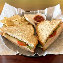 Camille's Sidewalk Cafe - Turkey Deluxe Sandwich on Wheat with Chips & Salsa - Mmm!