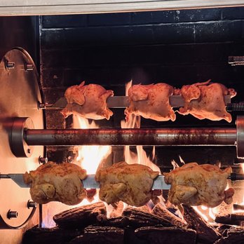 Smokin Chickin - chicken cooking in an oven - Chicken Shop Near Me - Nashville, Tennessee Smokin Chickin - chicken cooking in an oven - Chicken Shop Near Me - Nashville, Tennessee