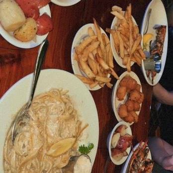 Capt. Anderson's Restaurant - my tables full meals ( minus some lobster we got later on) - Seafood Near Me - Panama City Beach, Florida Capt. Anderson's Restaurant - my tables full meals ( minus some lobster we got later on) - Seafood Near Me - Panama City Beach, Florida