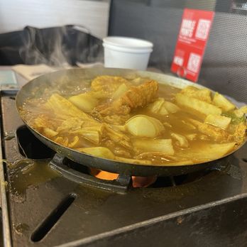 Boiling Point - Curry soup cooking on the individual burner - Taiwanese Near Me - Seattle, Washington Boiling Point - Curry soup cooking on the individual burner - Taiwanese Near Me - Seattle, Washington