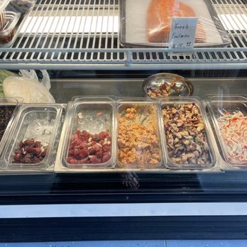 Choi's Poke - a variety of foods in a display case - Poke Near Me - Wahiawa, Hawaii Choi's Poke - a variety of foods in a display case - Poke Near Me - Wahiawa, Hawaii