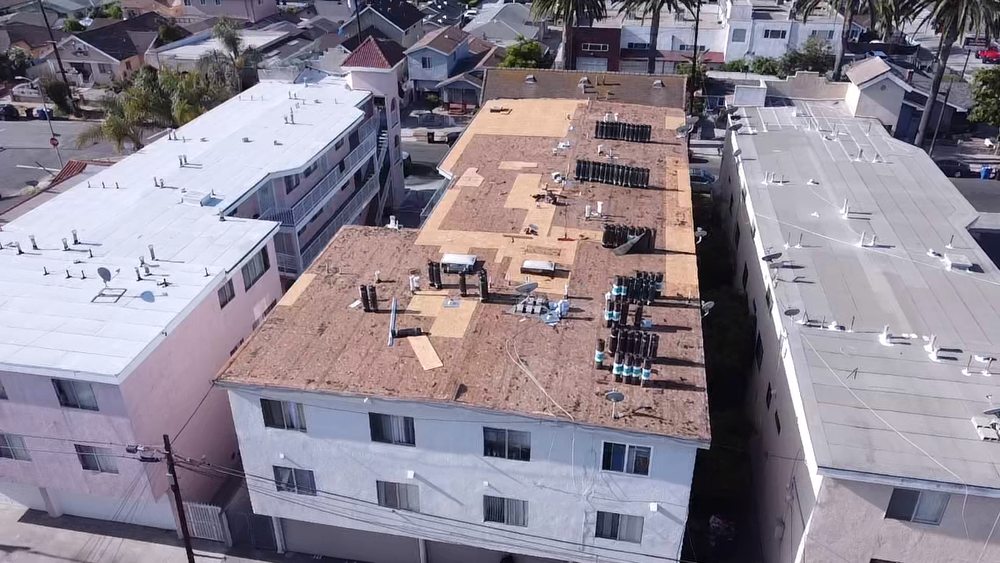 Slide of Meza Roofing Systems