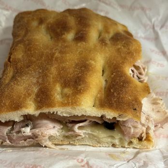 All’ Antico Vinaio - BADA COME LA FUMA Porchetta, smoked provola, roasted potato cream, and spicy eggplant. - Sandwiches Near Me - Rome, RM