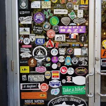 Schatzis Pub - Stickers on glass entrance door - German Near Me - Poughkeepsie, New York