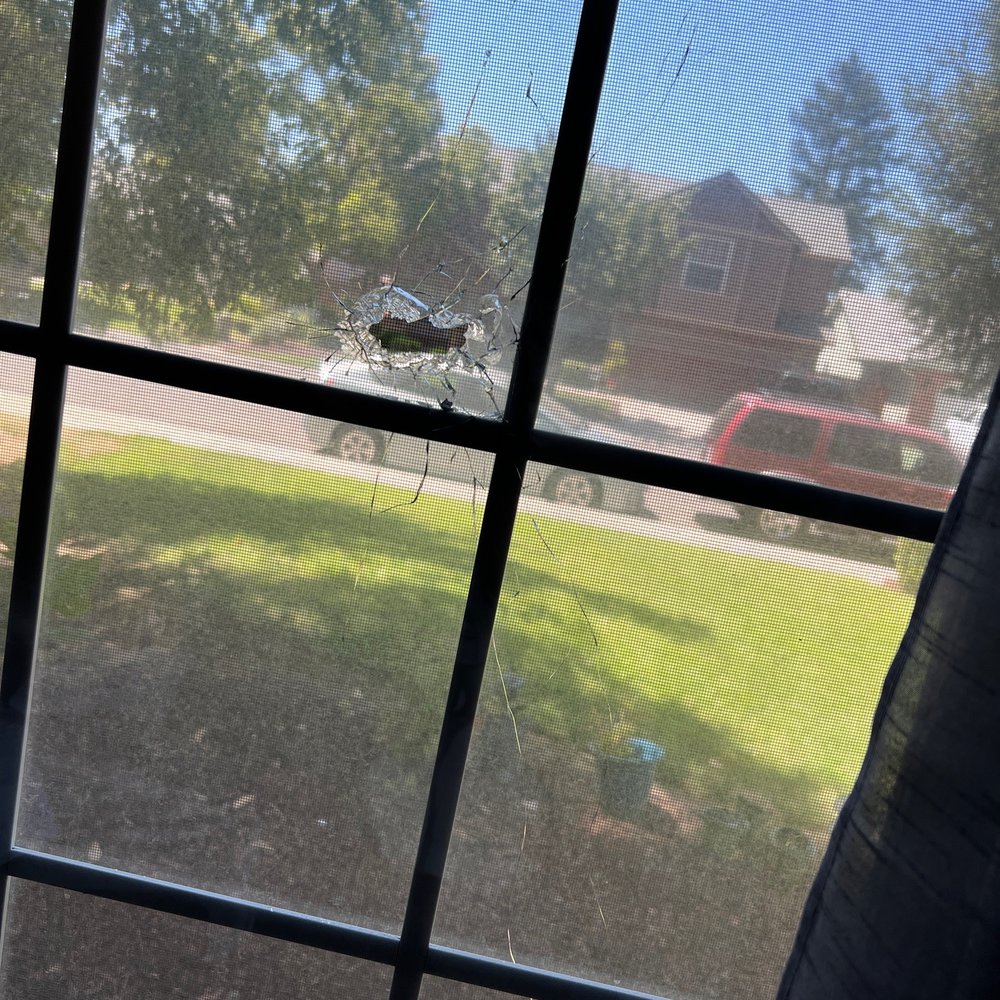 Neighborhood Property Management - Bullet hole in the window - Property Management Near Me Neighborhood Property Management - Bullet hole in the window - Property Management Near Me