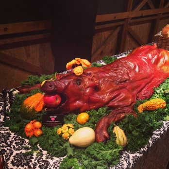Flying Pig Roast - Applewood smoked pig, garnished ready for the first cut! - Caterers Near Me - Minetto, New York Flying Pig Roast - Applewood smoked pig, garnished ready for the first cut! - Caterers Near Me - Minetto, New York