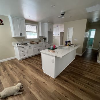 LANI Construction - a dog laying on the kitchen floor - General Contractors Near Me - Encino, California LANI Construction - a dog laying on the kitchen floor - General Contractors Near Me - Encino, California