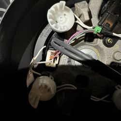 Loose  white wire broken away from block holding other wires