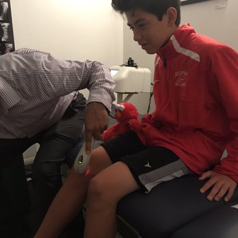 Axiom Health - Dr. Rudy takes the time to educate my teen on the physiology of the body - how an ankle injury from new shoes is the root of his knee pain. - Chiropractors Near Me - Venice, California