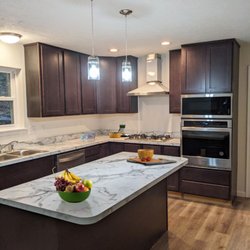 Classic Quality Homes - A kitchen featuring an island and granite. A great gathering place.