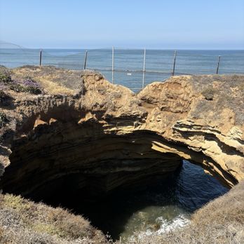 Sunset Cliffs Caves - The cave can be seen from above through a fence clearly not safe. but if you can access it probably cool to see from the bottom looking up - Parks Near Me - San Diego, California