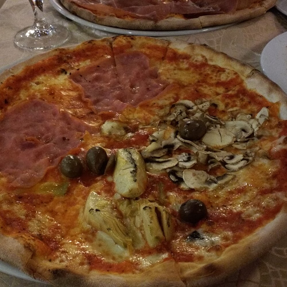 Ham, artichoke and olives pizza