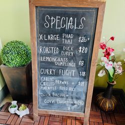 Sawasdee Thai Cuisine - Daily special board, as you enter. I missed the duck bacon or would have ordered it!