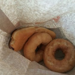 Dunkin' - That's my chocolate eclair upside down in a paper bag under other things.