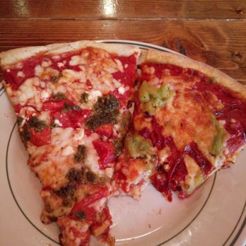 World Pizza - Pesto flavor on the left and wasabi pineapple on the right! (Forgot to take pictures before I had my bites, hah!) - Pizza Near Me - Seattle, Washington World Pizza - Pesto flavor on the left and wasabi pineapple on the right! (Forgot to take pictures before I had my bites, hah!) - Pizza Near Me - Seattle, Washington
