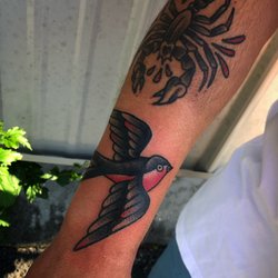 Sugg Street Tattoo - Sparrow and scorpion by Tony Logan