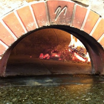 Jack's Wood Fired Oven - The extreme temperature of this oven cooks and toasts your food perfectly. - Pizza Near Me - Logan, Utah