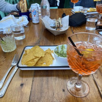 Happy Camper - CHIPS & GUAC APEROL SPRITZ - Bars Near Me - Chicago, Illinois Happy Camper - CHIPS & GUAC APEROL SPRITZ - Bars Near Me - Chicago, Illinois