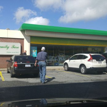 bp - a man standing in front of a convenience store - Gas Stations Near Me - Jamestown, North Carolina