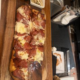 Pepperoni and burrata flatbread with hot honey Pepperoni and burrata flatbread with hot honey