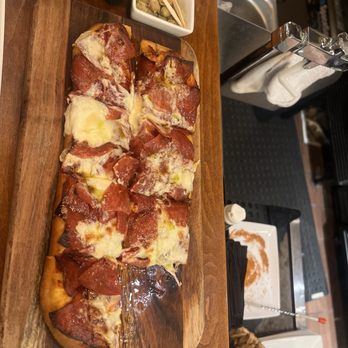 We Olive Wine Bar & Marketplace - Pepperoni and burrata flatbread with hot honey - Wine Bars Near Me - Pasadena, California We Olive Wine Bar & Marketplace - Pepperoni and burrata flatbread with hot honey - Wine Bars Near Me - Pasadena, California