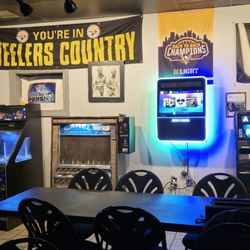 Concordia Club - TouchTunes Juke box, dart machine, ATM, and cigarette machine.
