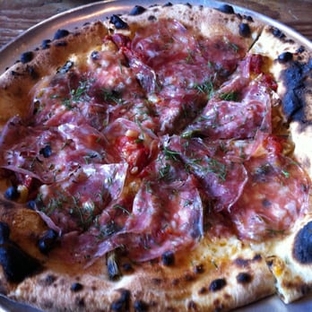 Gjelina - Carmelized fennel, confit tomato, green onion & spicy fennel salami pizza. http://Facebook.com/GoodEatsStacy - New American Near Me - Venice, California