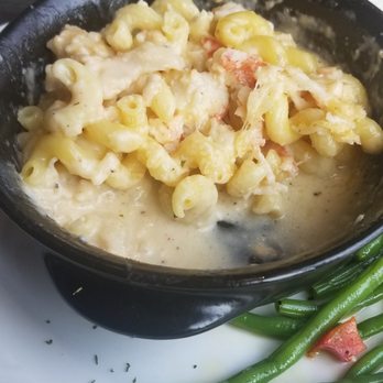 The Hook Lakeside Grill - Lobster Mac & Cheese (half finished to show how much lobster is in there) with green beans - New American Near Me - Mackinaw City, Michigan