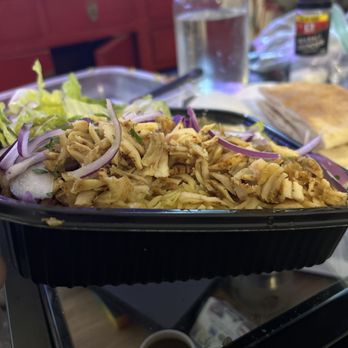 Falafel & Grill - A thin layer of chicken and the rest is rice....for $18 - Falafel Near Me - Chicago, Illinois Falafel & Grill - A thin layer of chicken and the rest is rice....for $18 - Falafel Near Me - Chicago, Illinois