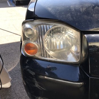 Detail Garage - Before pict of dull headlight lens - Auto Detailing Near Me - Escondido, California Detail Garage - Before pict of dull headlight lens - Auto Detailing Near Me - Escondido, California
