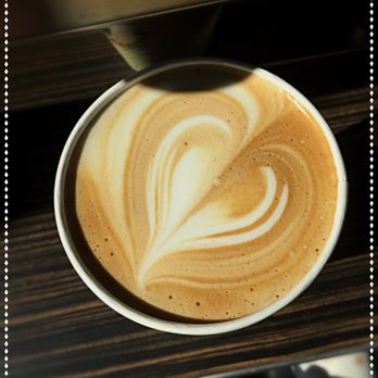 Prestige Espresso - a cup of coffee on a table - Coffee & Tea Near Me - Everett, Washington