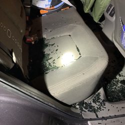 Chevron - Break in while standing in other side of car pumping gas