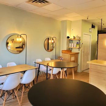 COFU Pressed Sushi - a dining area with tables and chairs - Japanese Near Me - Vancouver, British Columbia