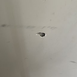They had a lock box on the wall. When they ripped it out it left this hole! They had a lock box on the wall. When they ripped it out it left this hole!