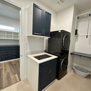 Inspired Closets Austin - Laundry Room cabinetry, shelving, and pull-down clothes rod - Cabinetry Near Me - Austin, Texas Inspired Closets Austin - Laundry Room cabinetry, shelving, and pull-down clothes rod - Cabinetry Near Me - Austin, Texas