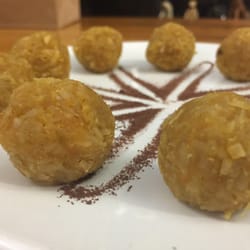 African Kitchen Gallery - #YelpLondonRainbow #Yellow coconut & carrot laddus