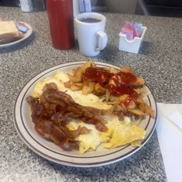 Cheese eggs bacon home fries and toast