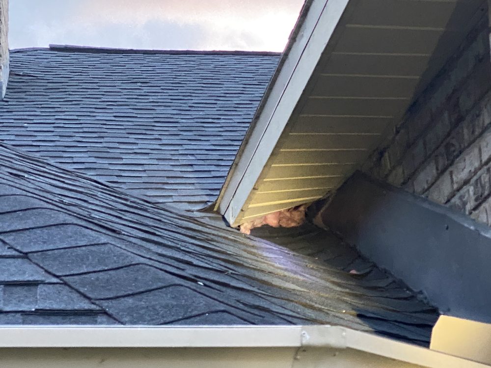 Slide of Rosser Roofing Solutions