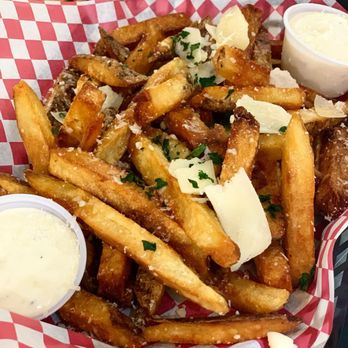 The Legends Grille - Legends famous hand cut fries - dressed up with truffle oil, parmesan cheese and house made garlic aioli. - Burgers Near Me - Aiken, South Carolina