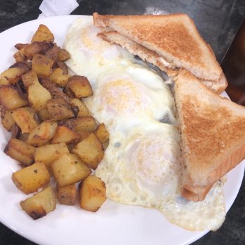Theo's Cozy Corner - Home fries, eggs, toast, and under the eggs was my corned beef hash. So yummy - Breakfast & Brunch Near Me - Boston, Massachusetts