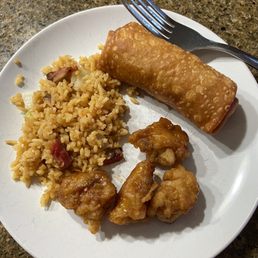 Orange chicken fried rice and pork egg roll Orange chicken fried rice and pork egg roll