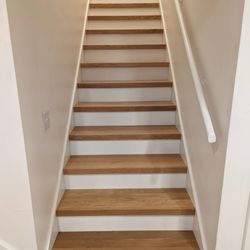 Built Better Bozeman - Re-treaded staircase using white oak treads.
